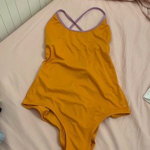 orange and purple one piece swimsuit